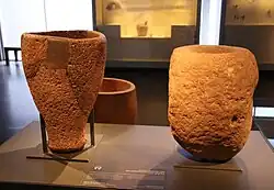 Limestone and basalt mortars, ʿAin Mallaha, Early Natufian, c. 12,000 BC
