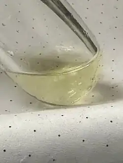 A sample of liquefied ketene (ethenone) at -60&nbsp;°C, yellow due to polymerization