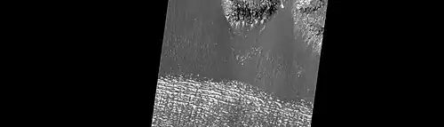 Close-up of surface of a lobate debris apron in Hellas quadrangle. Note the lines that are common in rock glaciers on the Earth.