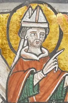 Miniature depiction of Thomas Becket; the bishop is wearing his ecclesiastical vestments, a chasuble and a mitre, conversing with a fellow monk whilst the four assassins stand outside of the cathedral.