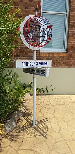 Monument marking Tropic of Capricorn near Civic Centre, Longreach, at mid-day of Summer solstice 2019. The monument is few arc seconds south of the Tropic of Capricorn (notice the shadow directly below the sign)