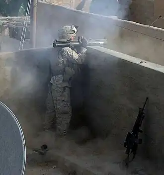 Marine firing an M72A7 in Iraq, 2005