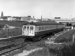 A Class 504 leaving the station. The island platform layout of the station, which remains today, is visible in the right-hand corner.