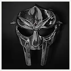 Modern MF DOOM mask facing the viewer.