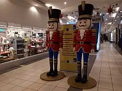 Mall sign on New Year's Eve, 31 December 2021, indicating the need for continued hand hygiene, social distancing and making use of one flow system.