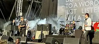 Manic Street Preachers in 2024. From left to right: touring member Nick Nasmyth, James Dean Bradfield, touring member Wayne Murray, Sean Moore and Nicky Wire.