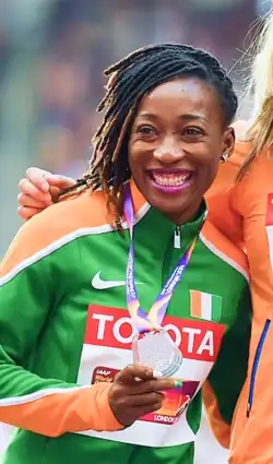 Marie-Josée Ta Lou receiving her 200 metre medal at the 2017 World Athletics Championships