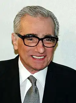 A picture of Martin Scorsese smiling away from the camera.