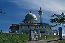 A building with a dome and turret