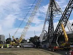 Cranes positioning deck section