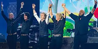 Paul McCartney and his band at the O2 Arena in 2024. From left: Wix Wickens, Rusty Anderson, Paul McCartney, Brian Ray, and Abe Laboriel Jr.