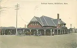 A postcard showing a Tudor-style railroad station
