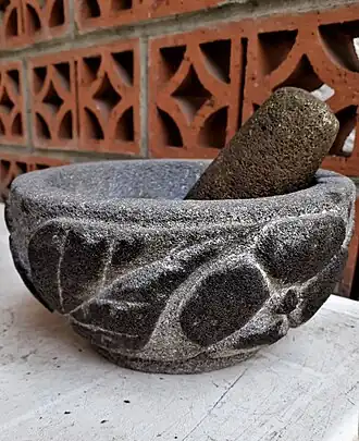 Molcáxitl with flower petal decoration, San Salvador el Seco, Puebla, México