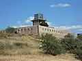 Watchtower over wineyards, known as the "Tour des Anglais" ("Tower of the Englishes"),[92] current establishment of the Army