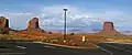 The view from Monument Valley Visitor Center parking lot looking west-southwest at Gray Whiskers (left) and Mitchell Butte (right).