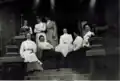 Porch of 4107 N Albina House with Mrs. Jeppesen and Friends Circa 1910