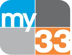 A four-quadrant rounded rectangle, from top left: blue, dark gray, light gray, light orange. In the blue box, the lowercase word "my" in white in a sans serif. In the lower lower right box, a white 33 in a sans serif.