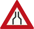 J17: Road narrows on both sides