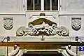 supraporta showing the insignia of the former shoemaker guild