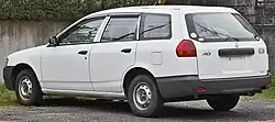 Facelifted Y11 Nissan AD van (rear)