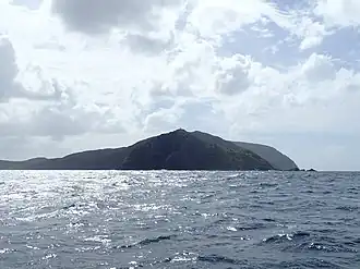 Murimotu Island (foreground) with the Lighthouse just visible on top, Otou just behind the light to the right and Surville Cliffs extending out to the right in the background