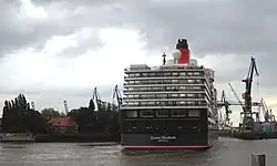 The Azipod system holds the ship in position against a wind from the north-east.