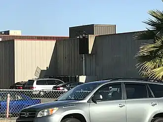 East side (Castle Rock Rd.), showing windowless concrete construction that is typical of the campus