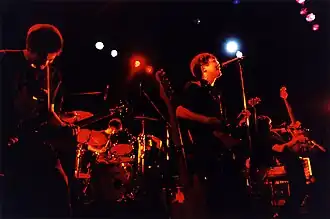 Number Girl performing in 1998. From left to right: Nakao, Inazawa, Mukai, Tabuchi