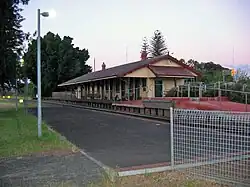 Station platform with wooden building