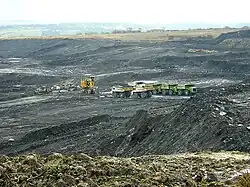 A large pit of coal