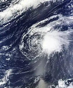 Satellite imagery of a disorganized tropical cyclone in the central Atlantic on October&nbsp;4