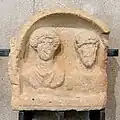 Top part of the tomb of a Roman couple