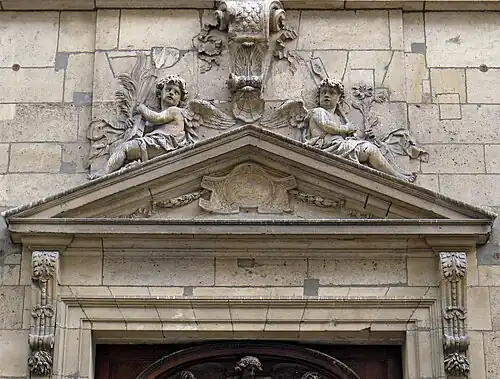 Side portal on rue des Bernardins, by Charles Le Brun (1669)