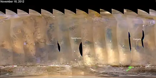 Nearly global mosaic of observations made by the MRO MARCI on Nov. 18, 2012, shows a dust storm in Mars' southern hemisphere