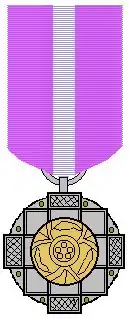 Padma Bhushan medal suspended from its riband