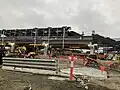 Southbound view of the newly-rebuilt elevated station, showing the uncompleted north side, June 2024