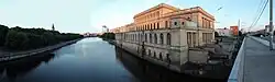 Panoramic view of the stock exchange building, Pregel River (center), Kneiphof island (left) and Estakadnyi Bridge (right) in Summer 2014