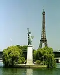 Statue of Liberty (with the Eiffel Tower in background)