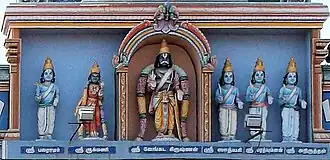The five Vrishni heroes standing in the Parthasarathy Temple, Eastern Torana Entrance. From left to right: Balarama, Rukmini, Vasudeva-Krishna (center), Pradyumna, Aniruddha and Satyaki
