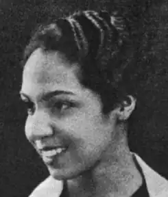 A young African-American woman with wavy hair