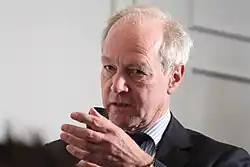 Peter Lilley MP, asking a question from the audience (15765548995).jpg