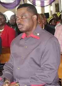 Willie Obiano sitting at the funeral of Bishop Simon Okafor
