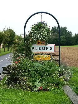 A roadsign on entering Pleurs