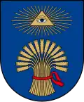 A coat of arms depicting the Eye of Providence with a blue iris encapsulated in a golden triangle surrounded in golden rays all on a blue background