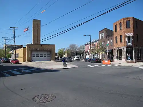 Point Breeze Avenue northern terminus. Federal Street running west is in the foreground. 20th Street is on the left, Point Breeze Avenue on the right. Philadelphia Fire Department Engine Company 24 visible at the corner with the Philadelphia Police Department 17th District office on the far left.