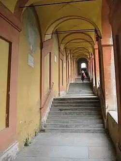 Stairway section of the Portico di San Luca in Bologna, featuring one of its 666 arches