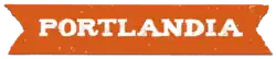 An image of an orange banner, in white text the banner reads "Portlandia".