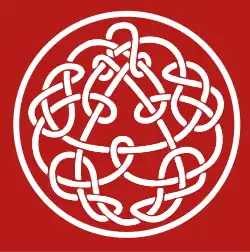 Modern Celtic-inspired design involving a circle surrounding a triangle; between them are undulating and crossing patterns. The background is crimson.