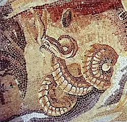 mosaic coiled snake in yellowish colour