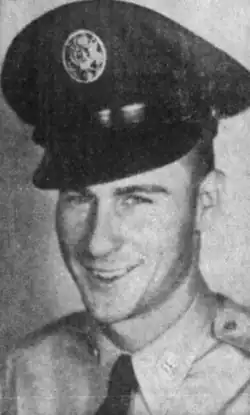 Black and white portrait photo of Allen wearing a military outfit